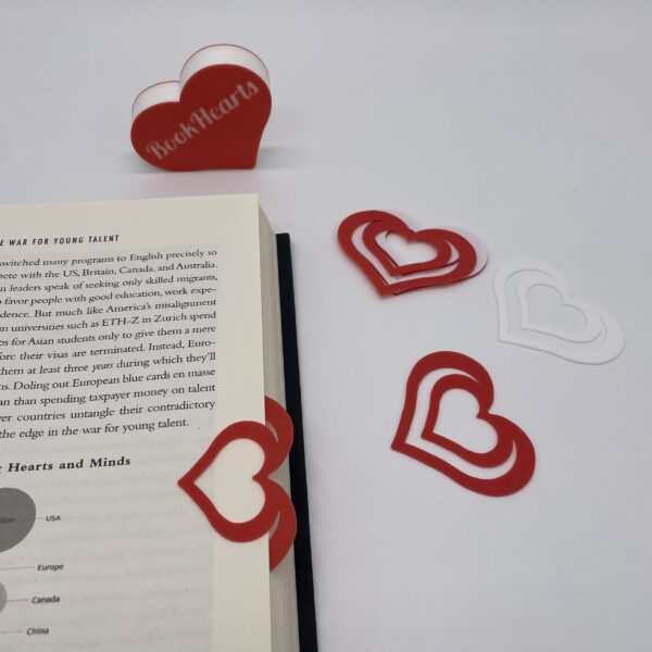 BookHeart bookmark in a festive red and white, perfect for spreading holiday cheer this winter, perfect gif for book lovers