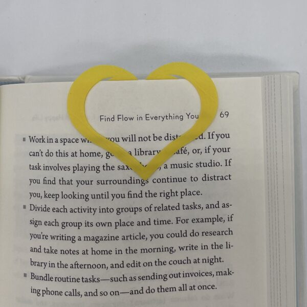 Bright yellow heart bookmark, great for kids’ and adults’ books alike