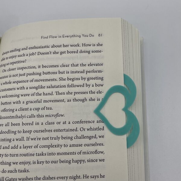 Simple, teal colored heart-shaped bookmark for a clean, classic look in any book, amazing tie idea